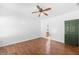 Bright bedroom featuring hardwood floors and access to bathroom at 2401 Centennial Hill Nw Way, Acworth, GA 30102