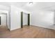 Well-lit bedroom with hardwood floors and double closets at 2401 Centennial Hill Nw Way, Acworth, GA 30102