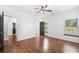 Hardwood floor bedroom with multiple access points to other rooms at 2401 Centennial Hill Nw Way, Acworth, GA 30102