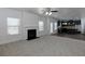 Open living room with fireplace and kitchen views at 325 Allgood Trce, Acworth, GA 30101