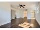 Main bedroom with hardwood floors and access to a bathroom at 5603 Owens Dr, Austell, GA 30106