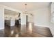 Bright dining room with hardwood floors and kitchen access at 5603 Owens Dr, Austell, GA 30106