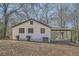 Rear view of house, showcasing covered patio at 5603 Owens Dr, Austell, GA 30106