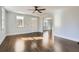 Bright living room featuring hardwood floors and an archway at 5603 Owens Dr, Austell, GA 30106