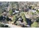 Aerial view of the home situated amongst lush greenery at 9935 La View Cir, Roswell, GA 30075