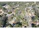 Aerial view showing home's location within a quiet tree-lined neighborhood at 9935 La View Cir, Roswell, GA 30075