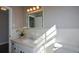 Modern bathroom, featuring a quartz vanity and a large mirror at 9935 La View Cir, Roswell, GA 30075