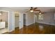 Main bedroom with hardwood floors and walk-in closet at 9935 La View Cir, Roswell, GA 30075