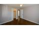 Well-lit bedroom with hardwood floors and a closet at 9935 La View Cir, Roswell, GA 30075