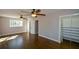 Large bedroom with hardwood floors, high ceilings and walk-in closet at 9935 La View Cir, Roswell, GA 30075