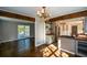 Open concept dining area with hardwood floors and kitchen views at 9935 La View Cir, Roswell, GA 30075