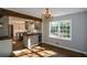 Bright dining area with hardwood floors and chandelier at 9935 La View Cir, Roswell, GA 30075