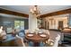 Elegant dining room with a chandelier and hardwood floors at 9935 La View Cir, Roswell, GA 30075