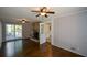 Living room with hardwood floors, fireplace and access to backyard at 9935 La View Cir, Roswell, GA 30075