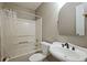 Clean bathroom with tub, sink, and mirror at 6108 Waterton Dr, Lithonia, GA 30058