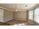 Bright bedroom with neutral walls and carpet at 6108 Waterton Dr, Lithonia, GA 30058