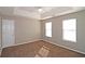 Spacious bedroom with neutral walls and carpet at 6108 Waterton Dr, Lithonia, GA 30058