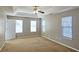 Large bedroom with neutral walls and carpet at 6108 Waterton Dr, Lithonia, GA 30058