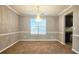 Dining room with chandelier and carpet flooring at 6108 Waterton Dr, Lithonia, GA 30058