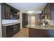 Kitchen with granite island and built-in microwave at 6108 Waterton Dr, Lithonia, GA 30058