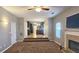 Spacious living room with fireplace and view into kitchen at 6108 Waterton Dr, Lithonia, GA 30058