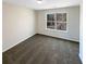 Bedroom with grey carpet and a window at 7227 Parks Trl, Fairburn, GA 30213