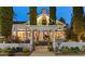Charming home exterior with a white picket fence and lush greenery at 3532 S Fulton Ave, Hapeville, GA 30354