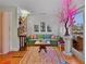 Comfortable living room shows bright decor, large windows, and hardwood floors at 3532 S Fulton Ave, Hapeville, GA 30354
