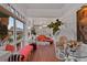 Bright sunroom featuring hardwood floors and ornate seating creating a cozy sitting space at 3532 S Fulton Ave, Hapeville, GA 30354
