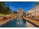 Inviting pool area with ample seating and covered patio, perfect for entertaining at 3532 S Fulton Ave, Hapeville, GA 30354