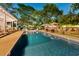 Inviting pool area with seating and patio space for relaxing and entertaining guests at 3532 S Fulton Ave, Hapeville, GA 30354