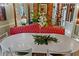 Elegant dining room featuring a unique table and red banquette at 3532 South Fulton Ave, Hapeville, GA 30354