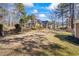 Large backyard with tiered deck and lush landscaping at 430 Flowering Trl, Grayson, GA 30017