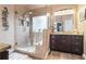 Luxurious bathroom with walk-in shower and granite vanity at 430 Flowering Trl, Grayson, GA 30017