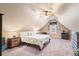 Large bedroom with a king bed and vaulted ceiling at 430 Flowering Trl, Grayson, GA 30017