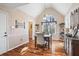 Bright dining room with hardwood floors and large window at 430 Flowering Trl, Grayson, GA 30017