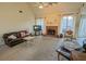 Living room with fireplace, vaulted ceiling and lots of light at 733 Exchange Mill, Dacula, GA 30019