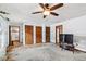 Open living area with multiple entrances and a large TV at 1105 Sallete Ct, Marietta, GA 30066