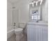 Bathroom with white vanity, tub, and tile flooring at 1699 Paddlewheel Dr, Marietta, GA 30062