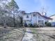 Two-story house with gray siding, walkway, and landscaping in winter at 1699 Paddlewheel Dr, Marietta, GA 30062