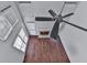 Living room with hardwood floors, fireplace, and ceiling fan at 1699 Paddlewheel Dr, Marietta, GA 30062