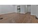 Living room with hardwood floors and view of kitchen at 1699 Paddlewheel Dr, Marietta, GA 30062