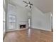 High-ceilinged living room with hardwood floors and fireplace at 1699 Paddlewheel Dr, Marietta, GA 30062