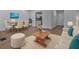 Living room with hardwood floors, sofa, and dining area view at 1699 Paddlewheel Dr, Marietta, GA 30062