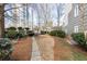 Condo backyard featuring a green space, a patio set, and views of the city in the background at 2499 Peachtree Ne Rd # 504, Atlanta, GA 30305
