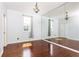 Bedroom features hardwood floors, natural light, and large mirrored wall at 2499 Peachtree Ne Rd # 504, Atlanta, GA 30305