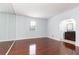 Bedroom with hardwood floors, full-length mirror, large window, and ensuite bathroom at 2499 Peachtree Ne Rd # 504, Atlanta, GA 30305