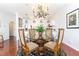 Elegant dining area with glass table and chandelier at 2499 Peachtree Ne Rd # 504, Atlanta, GA 30305