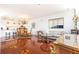 Open concept dining room with hardwood floors and chandelier at 2499 Peachtree Ne Rd # 504, Atlanta, GA 30305