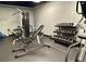 Fitness center featuring weight machines and free weights at 2499 Peachtree Ne Rd # 504, Atlanta, GA 30305